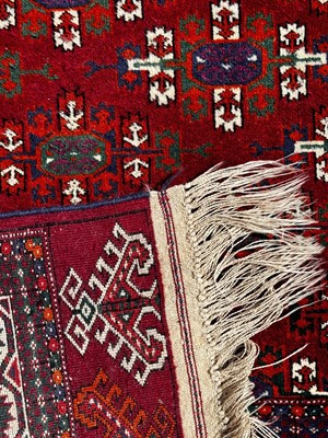 Lot 92 - A modern red ground Turkmenistan Yamout hand...