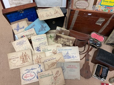 Lot 23 - A wooden trunk of collectors' items, to...