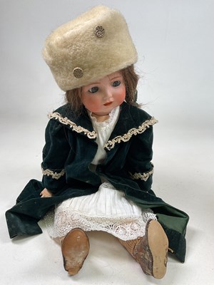 Lot 198 - An Edwardian bisque socket head doll with...