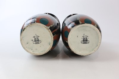Lot 2464 - ROYAL CAULDON; a pair of Cairo Ware vases...