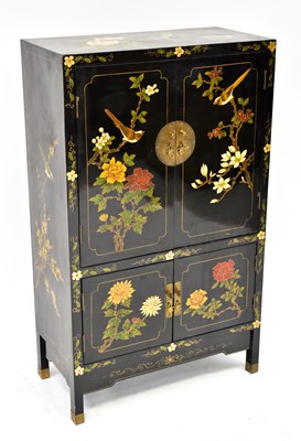 Lot 10 - A 20th century black lacquered cabinet...