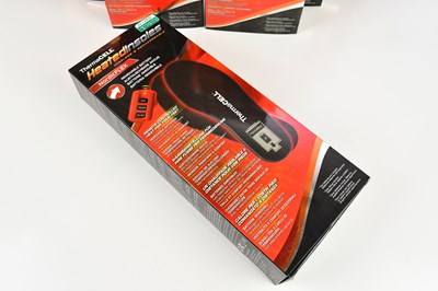 Lot 40 - THERMACELL; eight boxed heated insoles, size...