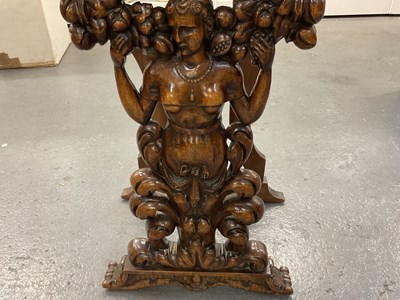Lot 45 - A late 19th century carved walnut figural side...